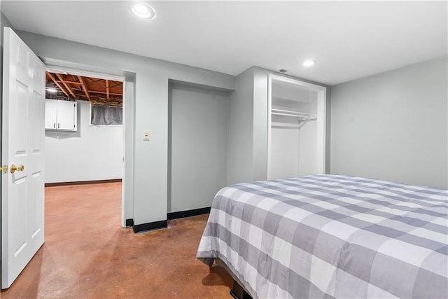 4510 E 113th St, Kansas City, MO 64137 - bedroom featuring concrete flooring, recessed lighting, and a closet