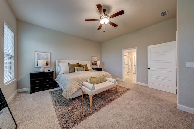 7526 Apache Dr, Lenexa, KS 66227 - bedroom with light carpet and ceiling fan