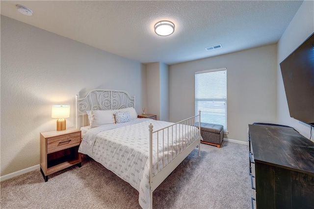 7526 Apache Dr, Lenexa, KS 66227 - bedroom with carpet flooring and a textured ceiling