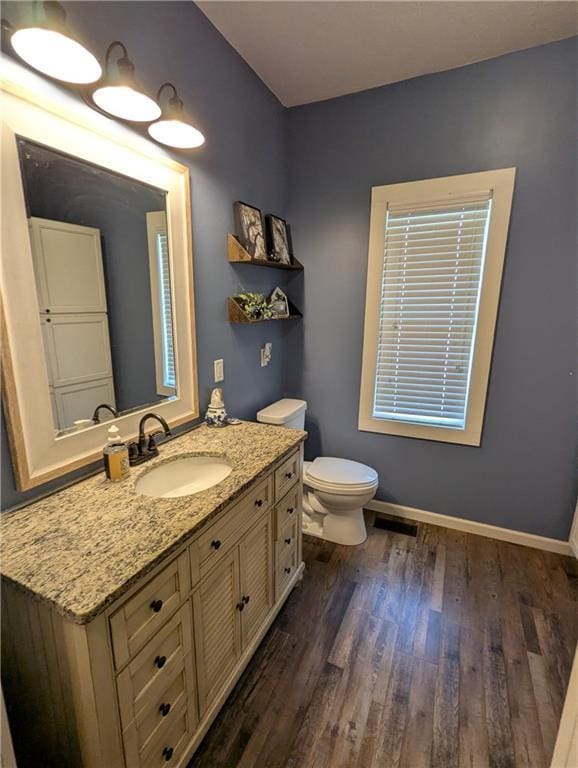 1208 Central Ave, Horton, KS 66439 - bathroom featuring wood finished floors and vanity