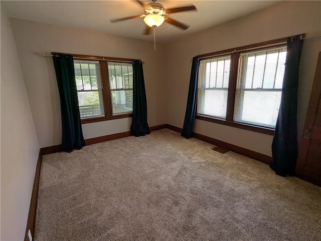 1208 Central Ave, Horton, KS 66439 - spare room with light carpet and a ceiling fan