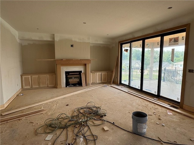 1824 Arbor Trl, Liberty, MO 64068 - unfurnished living room featuring a fireplace