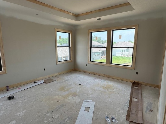 1824 Arbor Trl, Liberty, MO 64068 - unfurnished room with a tray ceiling and baseboards