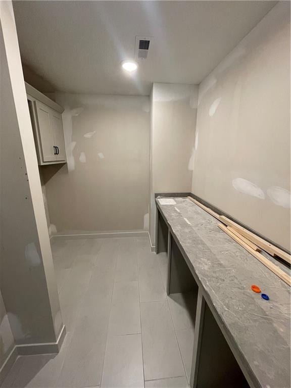 1824 Arbor Trl, Liberty, MO 64068 - mudroom with light tile patterned floors and baseboards
