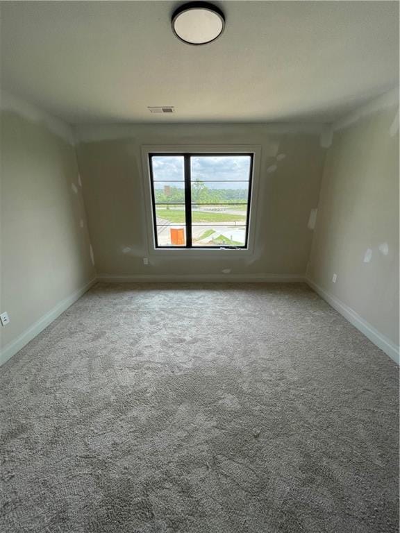 1824 Arbor Trl, Liberty, MO 64068 - carpeted empty room featuring baseboards
