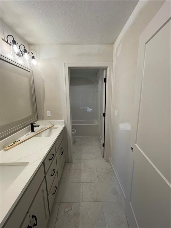 1824 Arbor Trl, Liberty, MO 64068 - full bathroom with double vanity and a textured ceiling