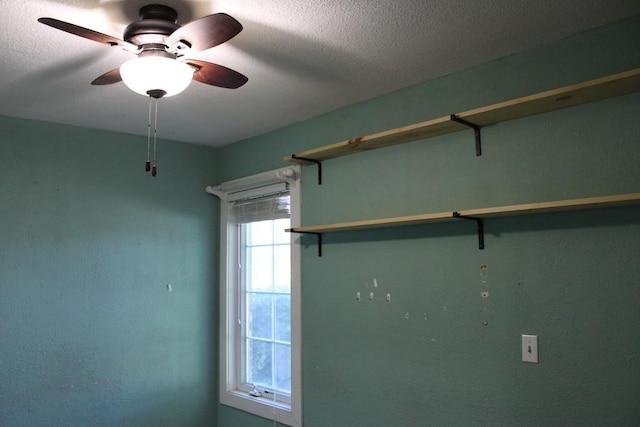 42 Driftwood Ln, Linn Valley, KS 66040 - unfurnished room with a textured ceiling and ceiling fan
