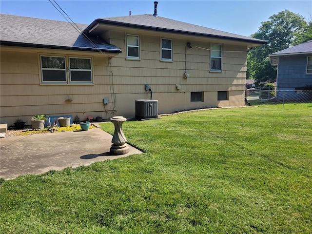 8603 E 85th St, Raytown, MO 64138 - rear view of house with a patio area and roof with shingles