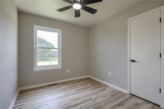 810 Bobwhite Dr, Peculiar, MO 64078 - unfurnished room featuring light wood-type flooring and a ceiling fan