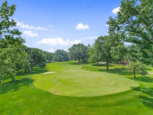12600 Wenonga Ln, Leawood, KS 66209 - view of home's community featuring view of golf course, a yard, and view of wooded area