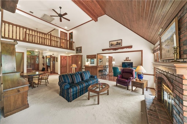 12600 Wenonga Ln, Leawood, KS 66209 - living area with carpet, a brick fireplace, ceiling fan, high vaulted ceiling, and wooden ceiling