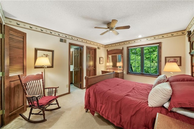12600 Wenonga Ln, Leawood, KS 66209 - bedroom with light colored carpet and a textured ceiling