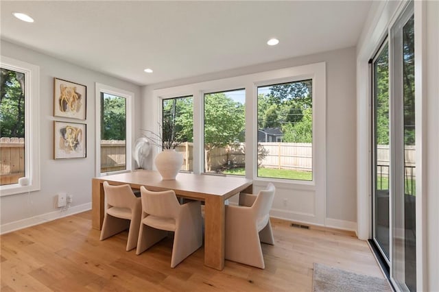 7106 Linden St, Prairie Village, KS 66208 - dining space featuring plenty of natural light, light wood-type flooring, and recessed lighting