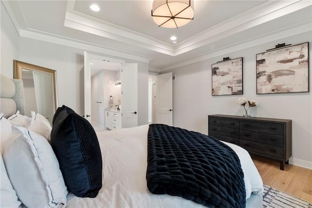 7106 Linden St, Prairie Village, KS 66208 - bedroom with light wood-style floors, a raised ceiling, recessed lighting, and ornamental molding