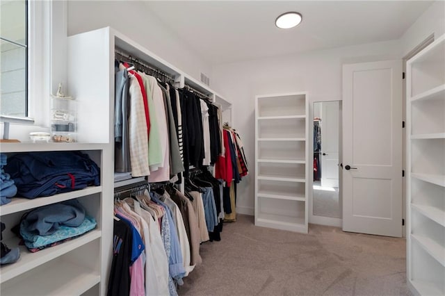 7106 Linden St, Prairie Village, KS 66208 - walk in closet featuring carpet flooring