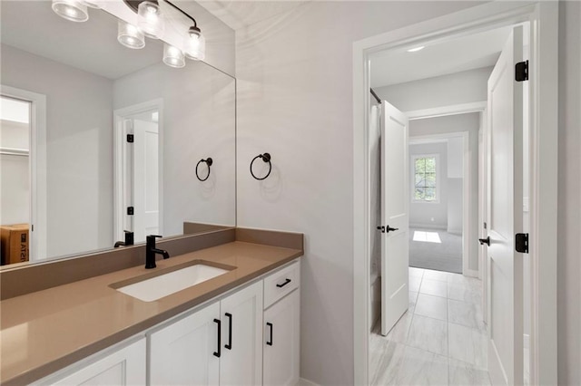 7106 Linden St, Prairie Village, KS 66208 - bathroom featuring marble finish floors and vanity