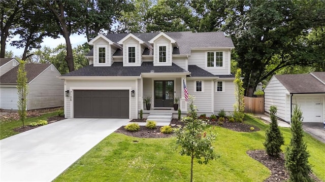 7106 Linden St, Prairie Village, KS 66208 - view of front of property featuring driveway, a shingled roof, and french doors