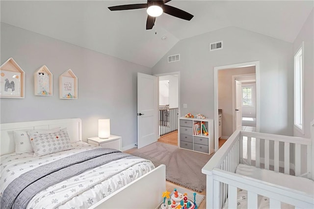 7106 Linden St, Prairie Village, KS 66208 - bedroom with lofted ceiling, a ceiling fan, and light wood-style floors