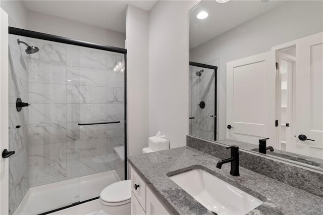 7106 Linden St, Prairie Village, KS 66208 - bathroom with vanity, a shower stall, and recessed lighting