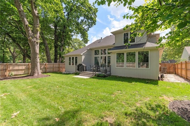 7106 Linden St, Prairie Village, KS 66208 - rear view of property with a fenced backyard, a wooden deck, and a shingled roof