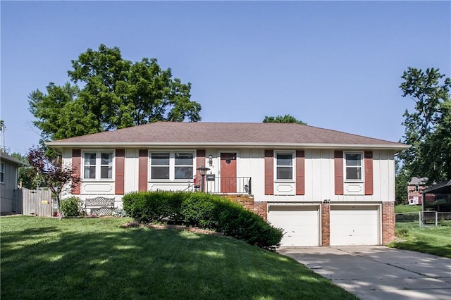 3920 S Milton Dr, Independence, MO 64055 - single story home featuring a garage, concrete driveway, brick siding, and board and batten siding