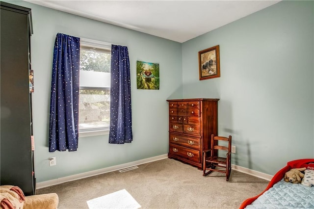 3920 S Milton Dr, Independence, MO 64055 - bedroom with carpet flooring and baseboards