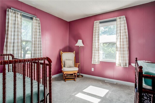 3920 S Milton Dr, Independence, MO 64055 - carpeted bedroom featuring baseboards