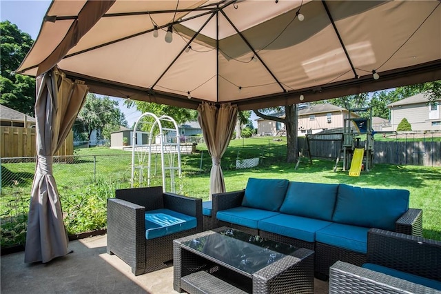 3920 S Milton Dr, Independence, MO 64055 - view of patio with a gazebo, an outdoor living space, and a playground