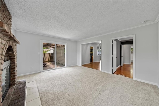 1822 Rankin Dr, Independence, MO 64055 - unfurnished living room featuring carpet flooring, a large fireplace, crown molding, and a textured ceiling