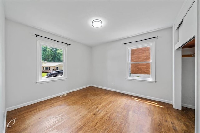 1822 Rankin Dr, Independence, MO 64055 - unfurnished bedroom featuring light wood-style flooring and a closet
