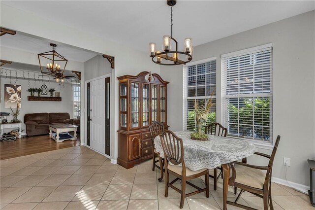 408 Eisenhower Rd, Baldwin City, KS 66006 - dining room with a chandelier, healthy amount of natural light, and light tile patterned floors