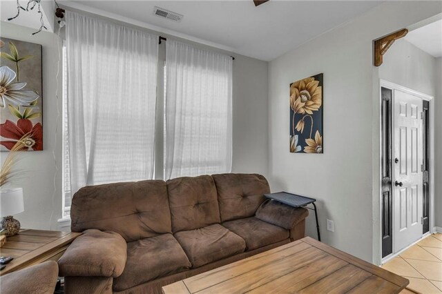 408 Eisenhower Rd, Baldwin City, KS 66006 - living area with light tile patterned floors