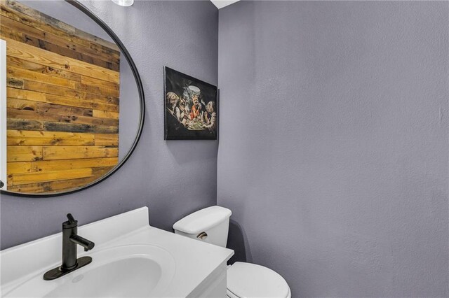 408 Eisenhower Rd, Baldwin City, KS 66006 - bathroom with vanity and a textured wall