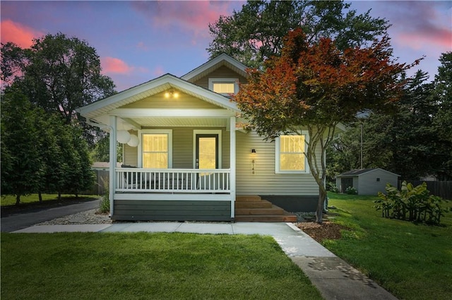 8146 Craig St, Overland Park, KS 66204 - view of front of property with a porch and a front yard