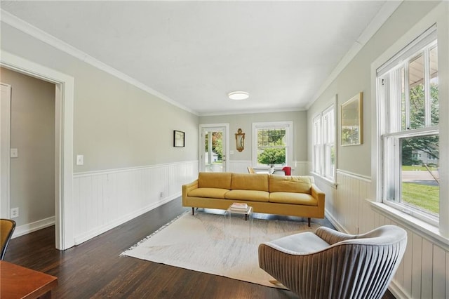 8146 Craig St, Overland Park, KS 66204 - living area featuring wood finished floors, wainscoting, and crown molding