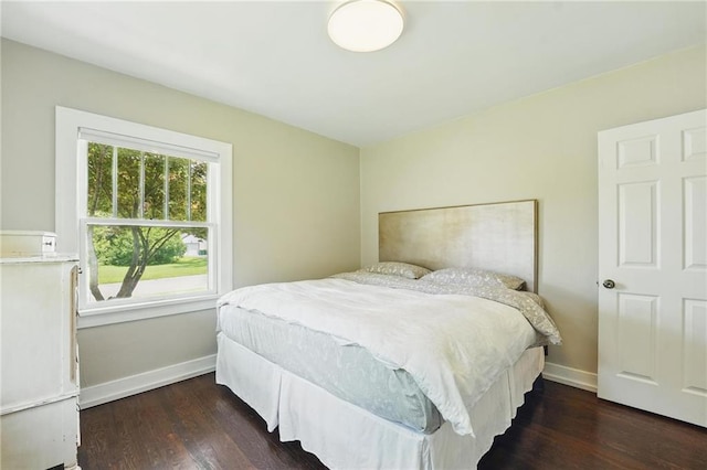 8146 Craig St, Overland Park, KS 66204 - bedroom featuring wood finished floors and baseboards