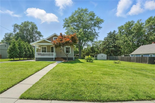 8146 Craig St, Overland Park, KS 66204 - view of front of property with covered porch and a storage unit