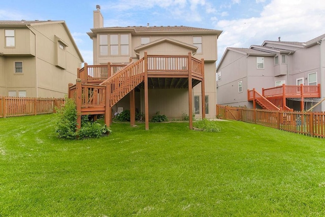 8110 W 144th Pl, Overland Park, KS 66223 - rear view of property with stairway, a deck, a fenced backyard, and a chimney