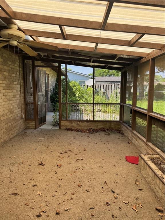 1110 S Plummer Ave, Chanute, KS 66720 - view of unfurnished sunroom