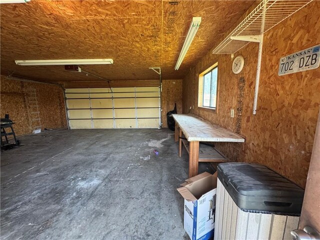 1110 S Plummer Ave, Chanute, KS 66720 - garage with a garage door opener
