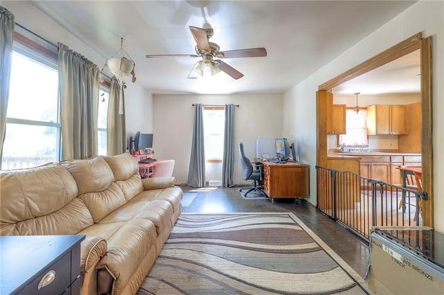 1401 Osage St, Leavenworth, KS 66048 - living room with a desk, dark wood finished floors, and ceiling fan