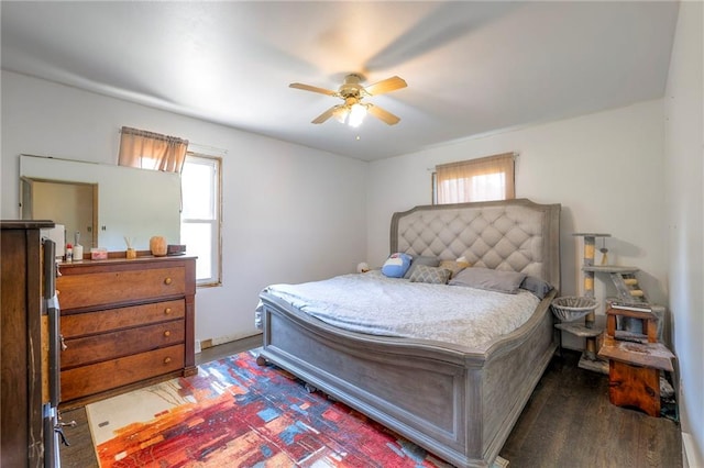 1401 Osage St, Leavenworth, KS 66048 - bedroom featuring multiple windows, wood finished floors, and a ceiling fan