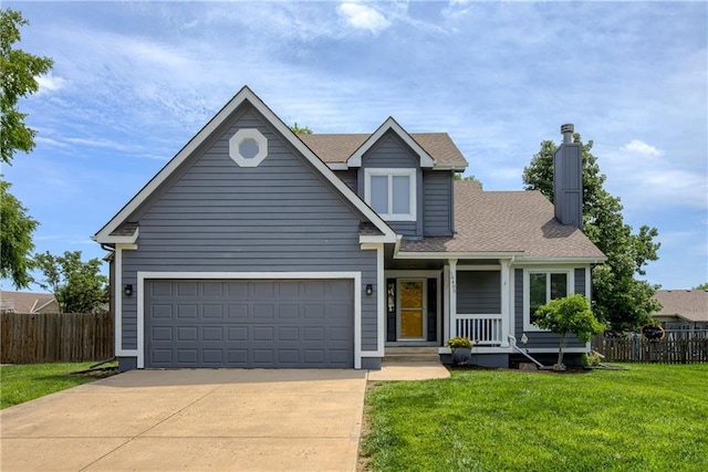 18405 Oak St, Gardner, KS 66030 - traditional-style house with concrete driveway, a chimney, a porch, and roof with shingles