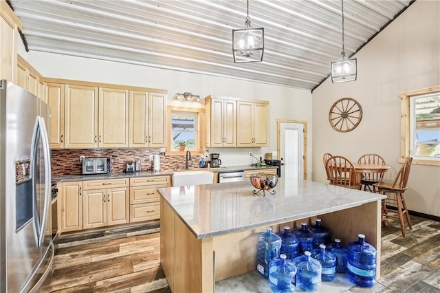 301 NW 1601st Rd, Kingsville, MO 64061 - kitchen with stainless steel fridge with ice dispenser, a sink, light brown cabinetry, vaulted ceiling, and wood finished floors