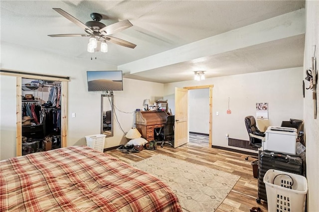 301 NW 1601st Rd, Kingsville, MO 64061 - bedroom featuring a desk, light wood-style flooring, baseboards, and ceiling fan