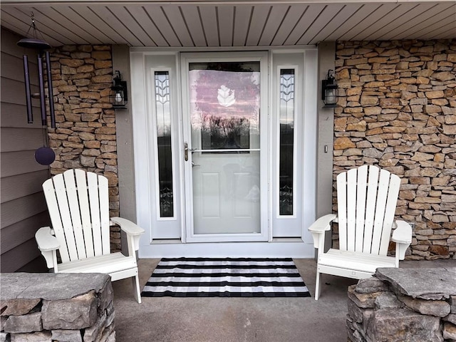 26609 S Red Bud Rd, Freeman, MO 64746 - entrance to property with stone siding and a porch