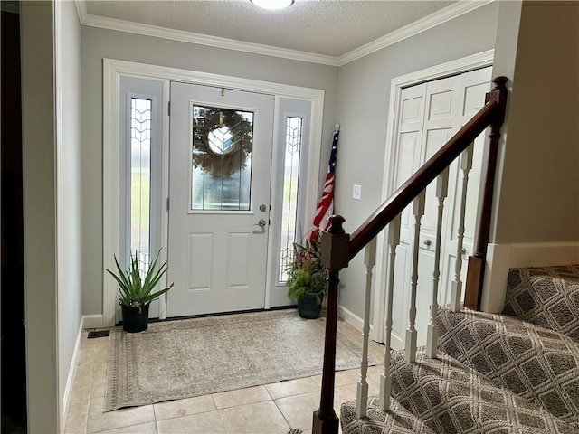 26609 S Red Bud Rd, Freeman, MO 64746 - foyer with light tile patterned flooring, stairway, crown molding, and a textured ceiling