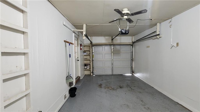 411 S Fulton St, Butler, MO 64730 - garage featuring a garage door opener and baseboards