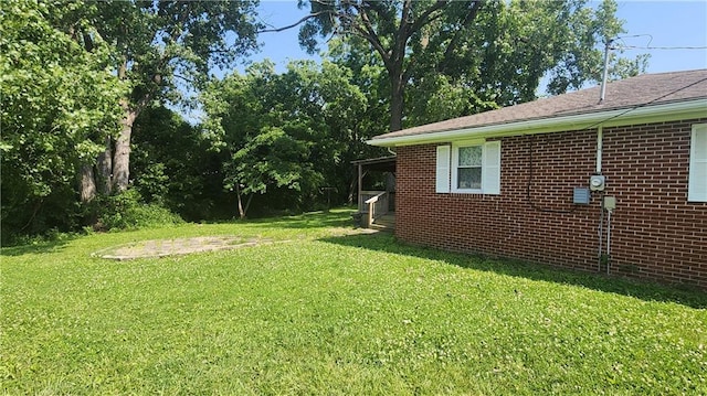 411 S Fulton St, Butler, MO 64730 - view of green lawn