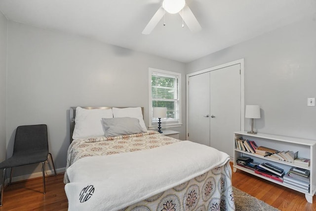 8604 Sagamore Rd, Leawood, KS 66206 - bedroom featuring wood finished floors, a closet, and a ceiling fan